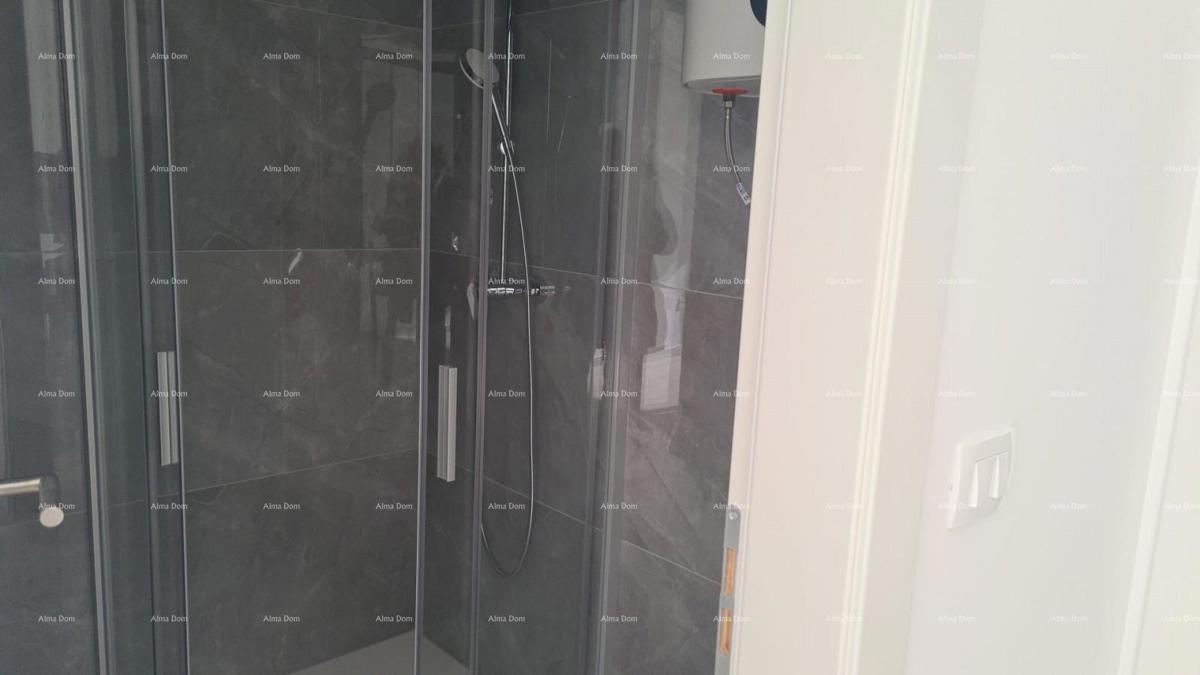 Moderen apartma v bloku D z dvema parkirnima mestoma, blizu Umaga!