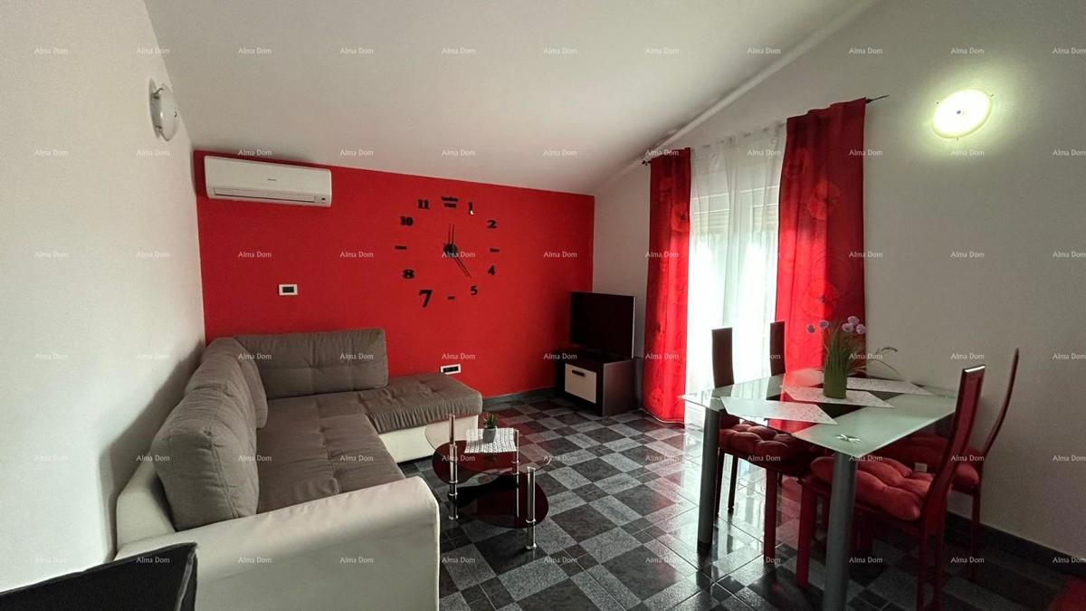 Prodajamo hišo z več apartmaji in bazenom.