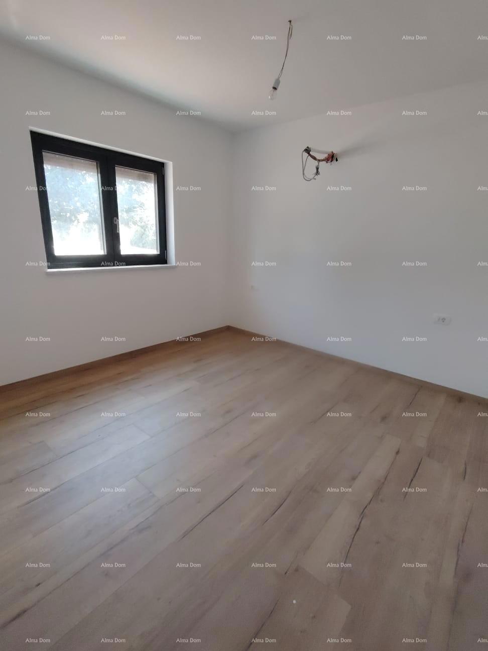 Dvosoban stan z vrtom v bližini morja. MEDULIN.