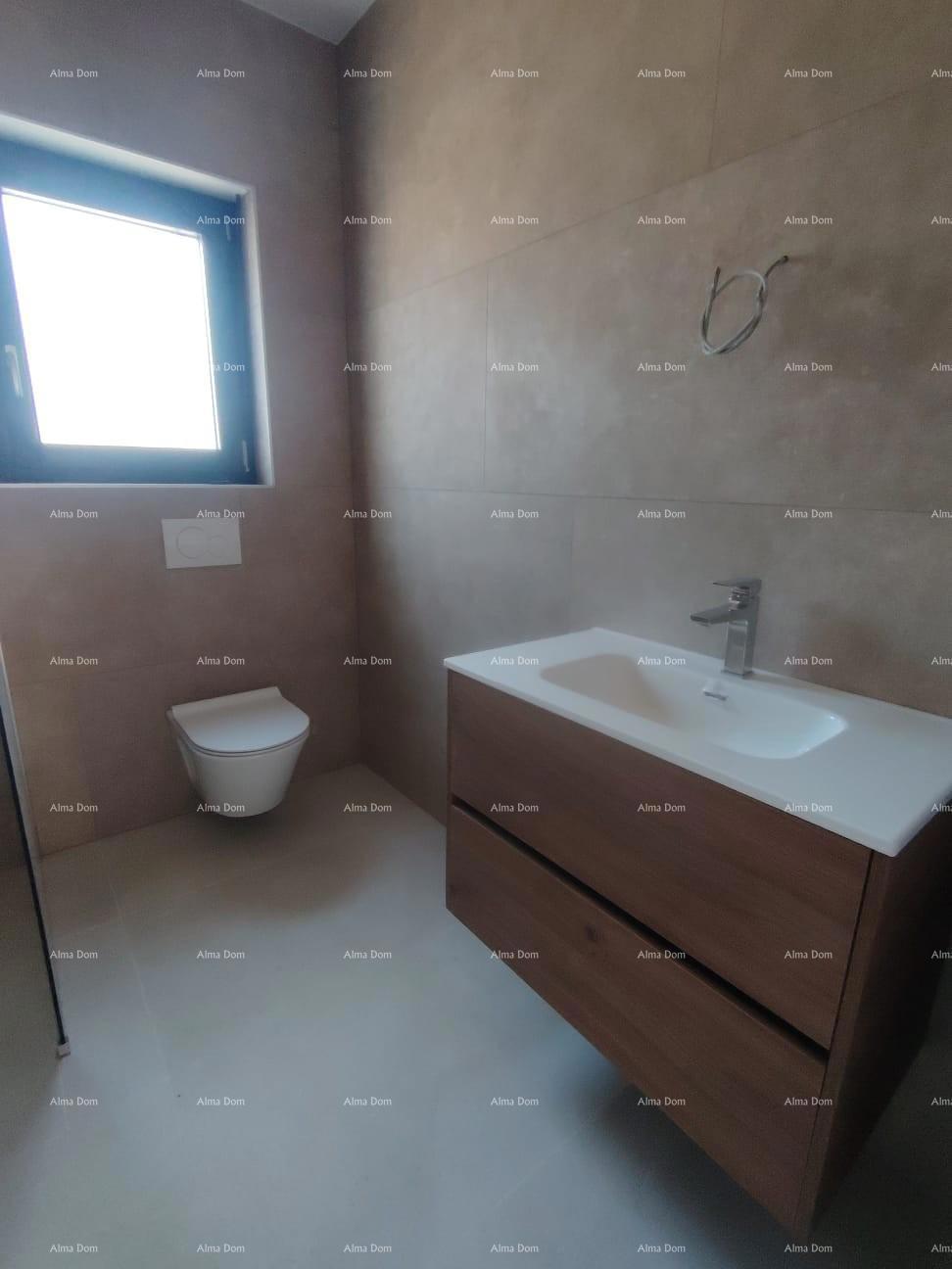 Dvosoban stan z vrtom v bližini morja. MEDULIN.