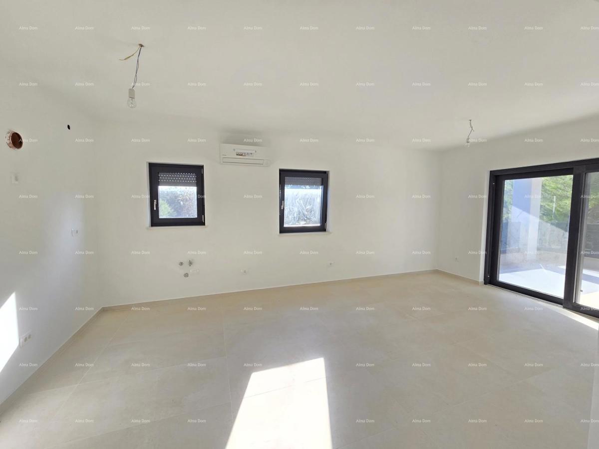 Trosobno stanovanje v 1. nadstropju novogradnje v bližini morja