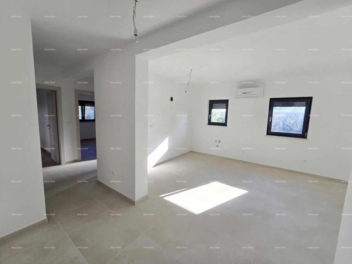 Trosobno stanovanje v 1. nadstropju novogradnje v bližini morja