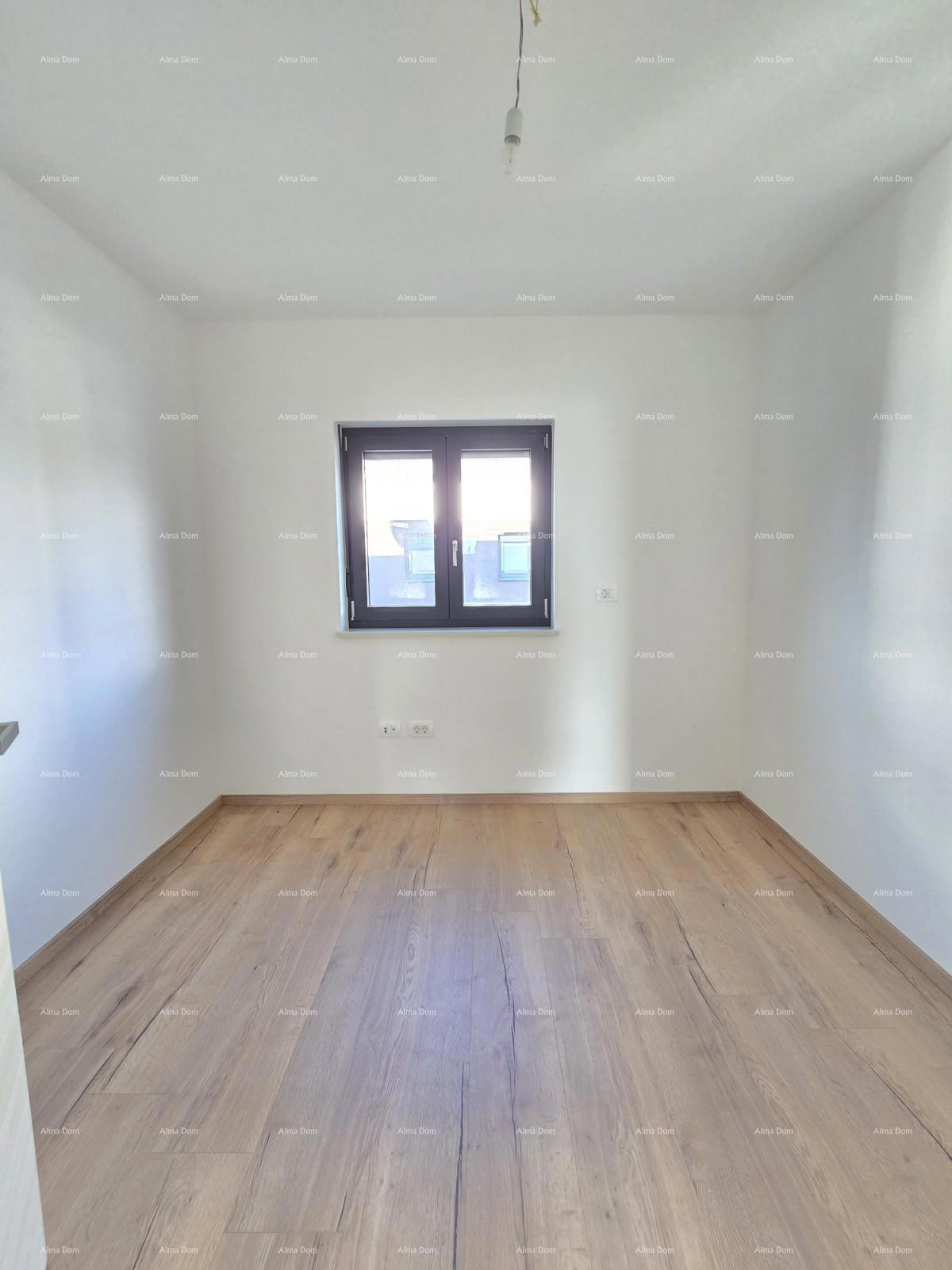 Trosobno stanovanje v 1. nadstropju novogradnje v bližini morja