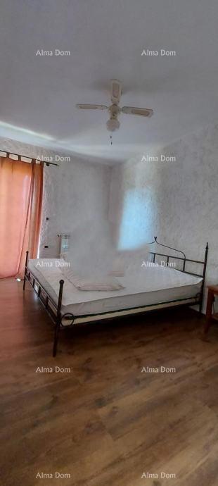Rovinj – stanovanjsko-poslovna zgradba z uhodanim poslovanjem