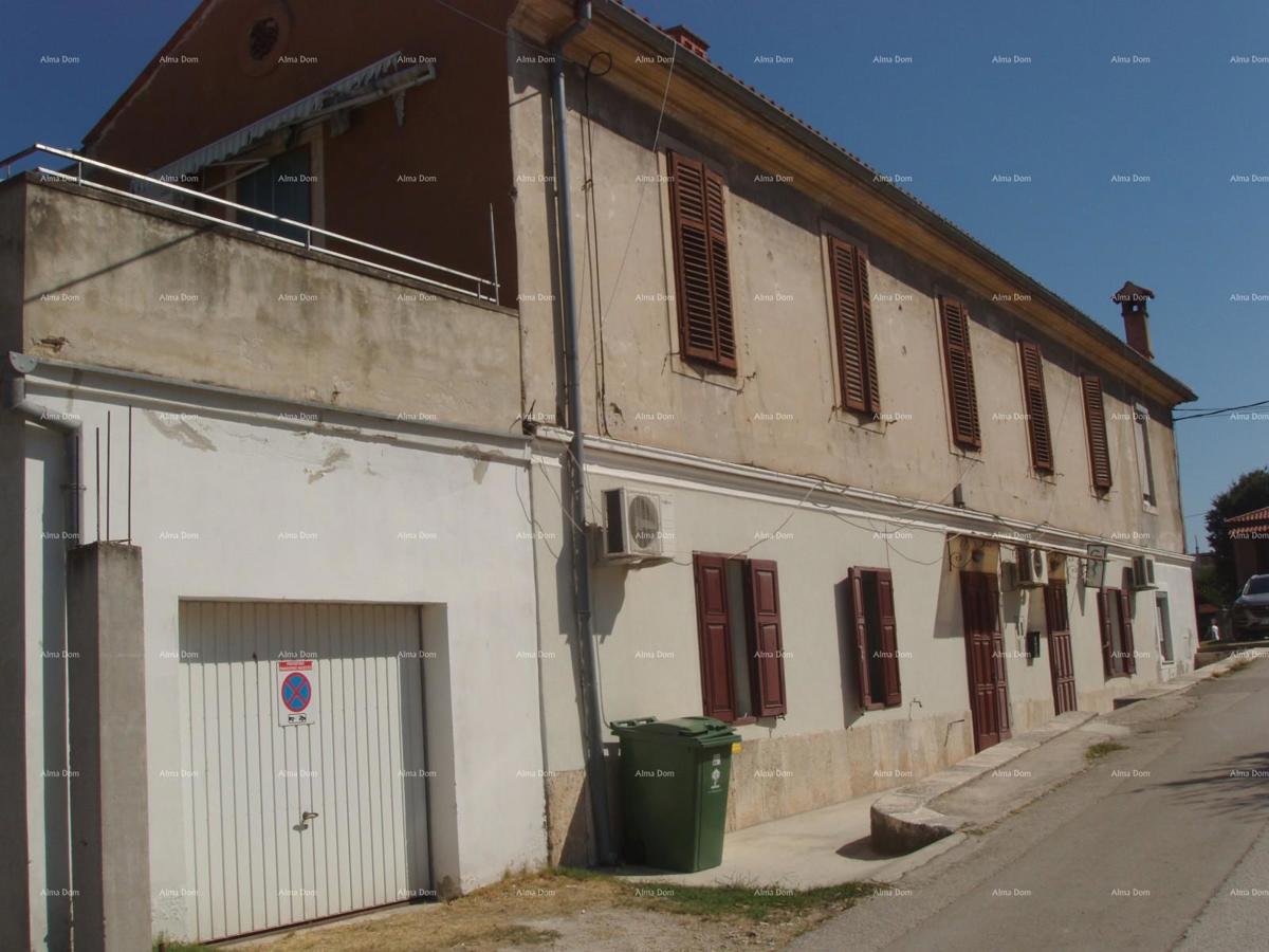 Pula. Hiša s poslovnim prostorom in garažo!