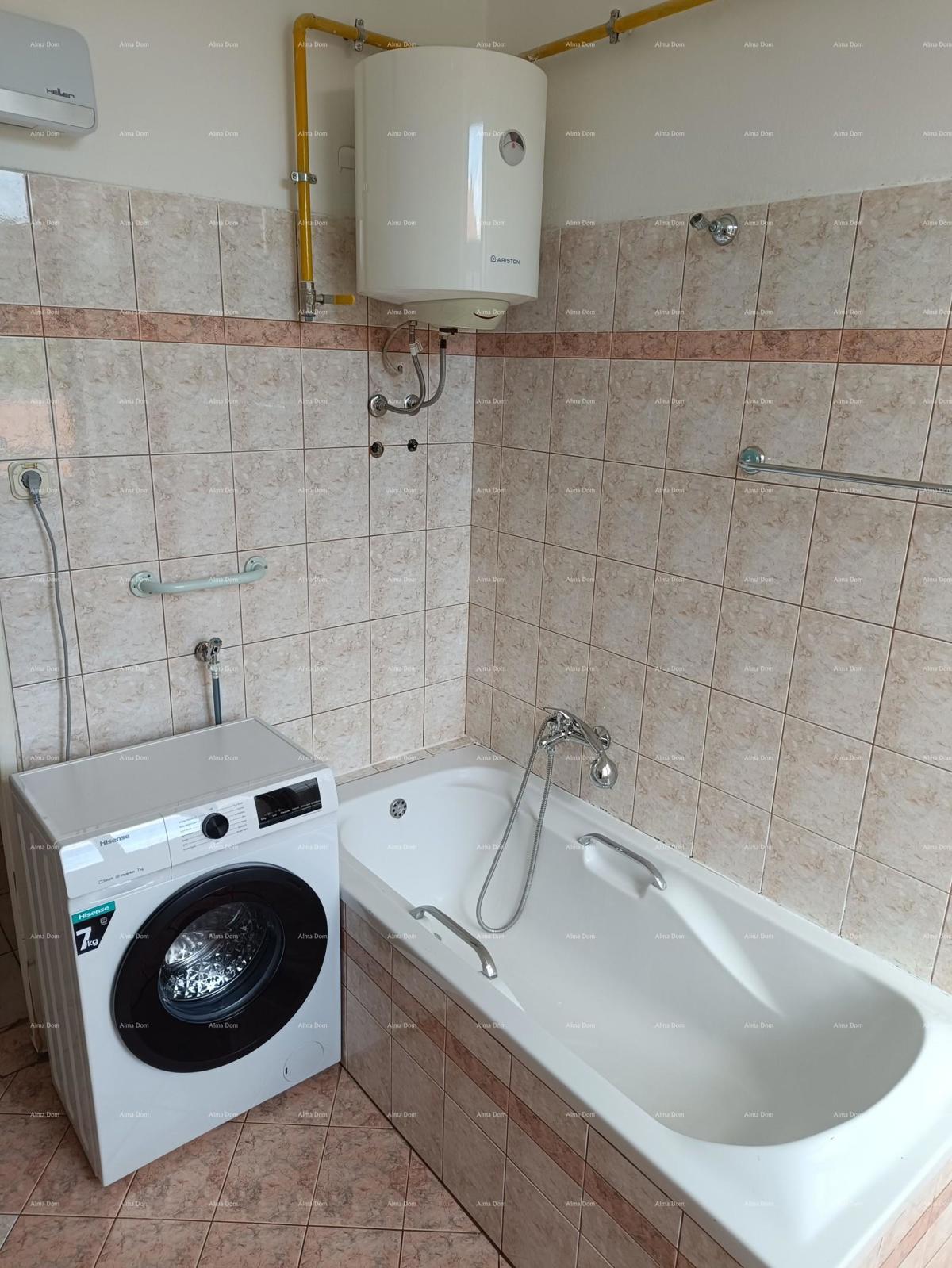 Pula. Hiša s poslovnim prostorom in garažo!