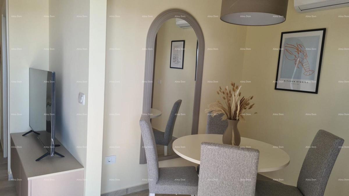 Moderen apartma v bloku F, z dvema parkirnima mestoma in shrambo, v bližini Umaga! F2