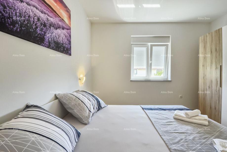 Prodaja dvoetažnega stanovanja z velikim vrtom in garažo, Ližnjan!