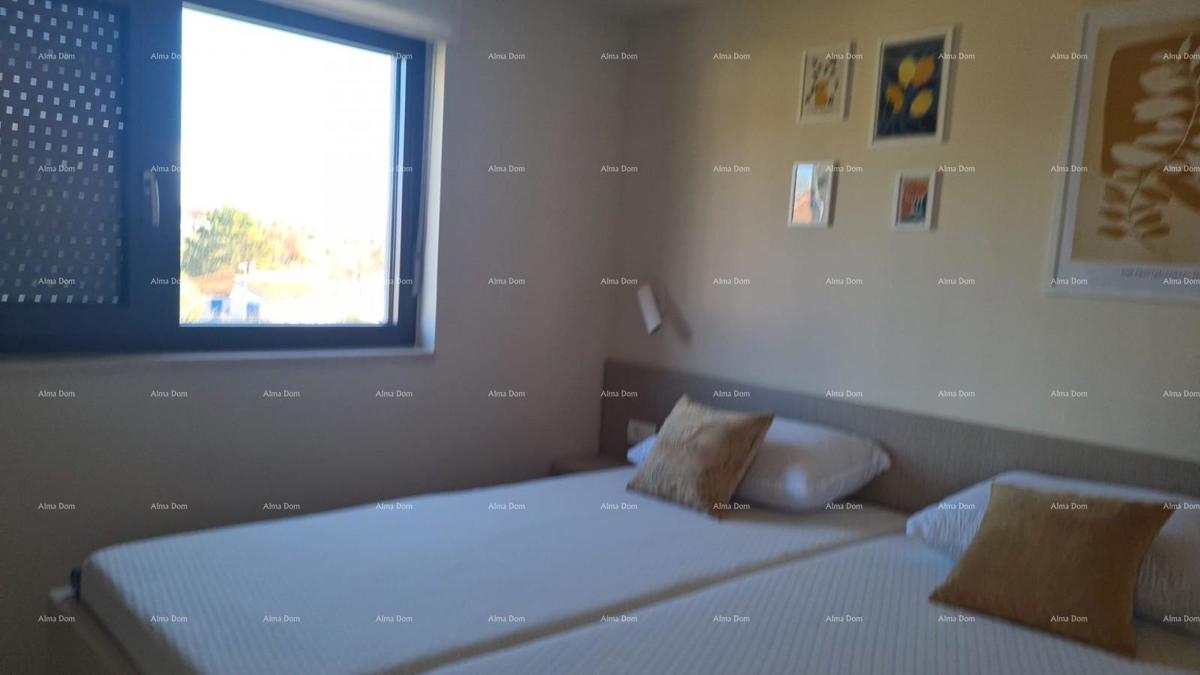 Moderen apartma v bloku E s parkirnim mestom in shrambo, blizu Umaga!