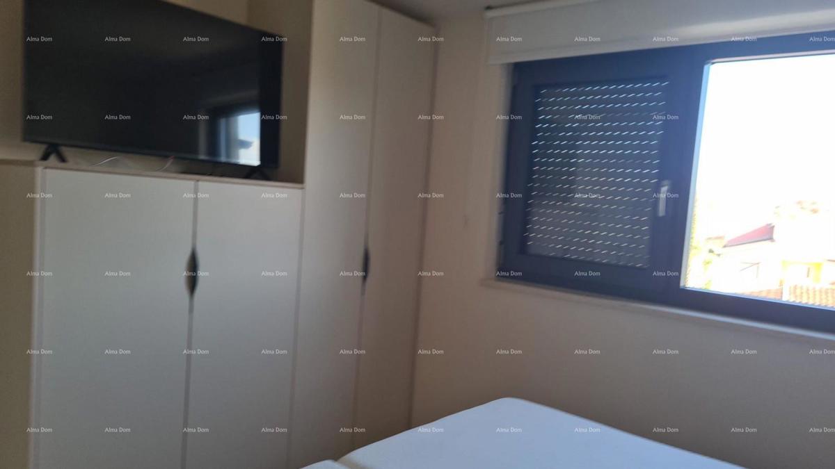 Moderen apartma v bloku E s parkirnim mestom in shrambo, blizu Umaga!