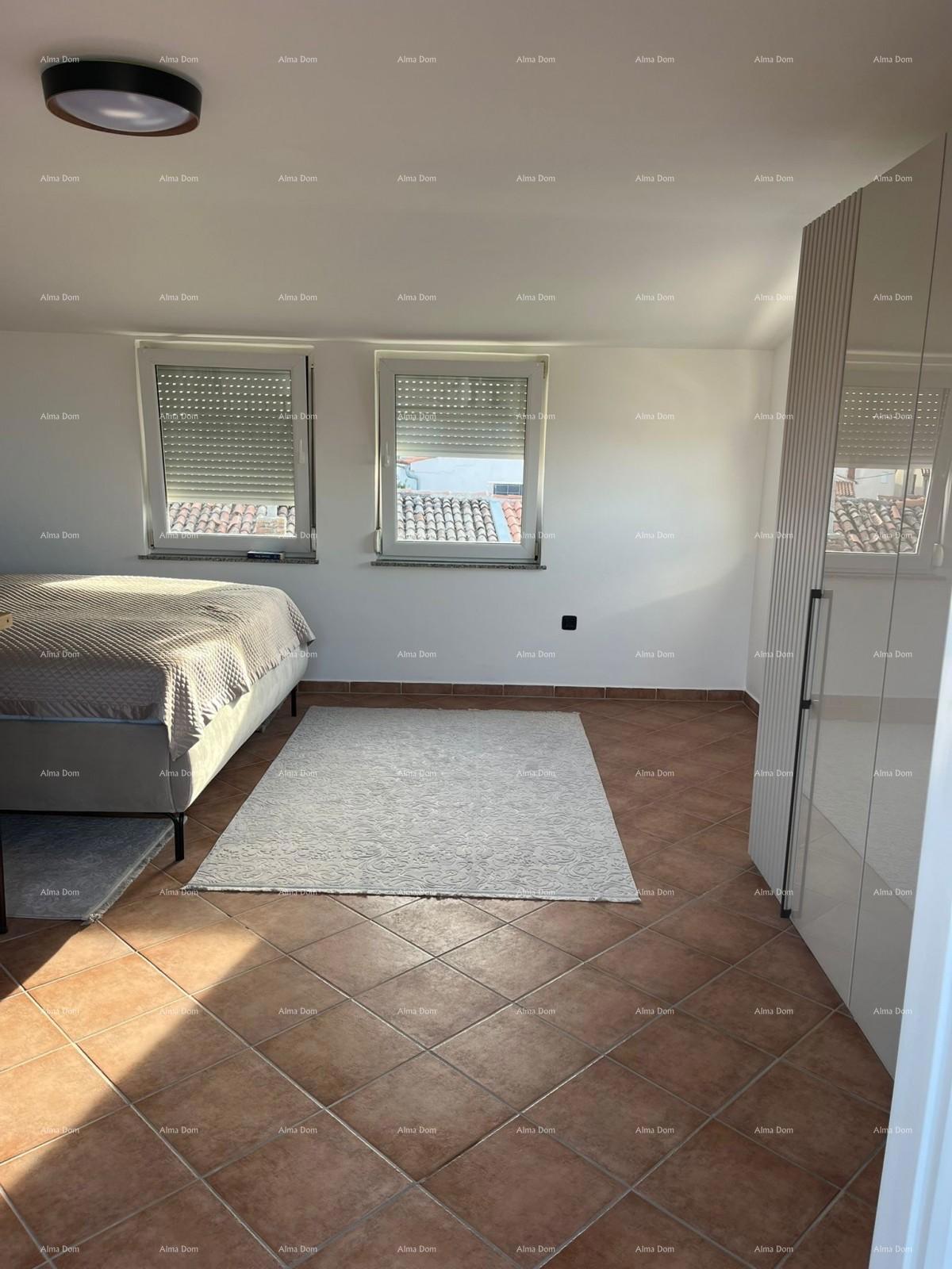 Prodaja - prenovljena hiša na odlični lokaciji z dvema apartmajema in čudovitim razgledom, Medulin!