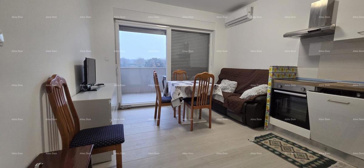 Lep dvosoban stan s teraso na odlični lokaciji v Medulinu