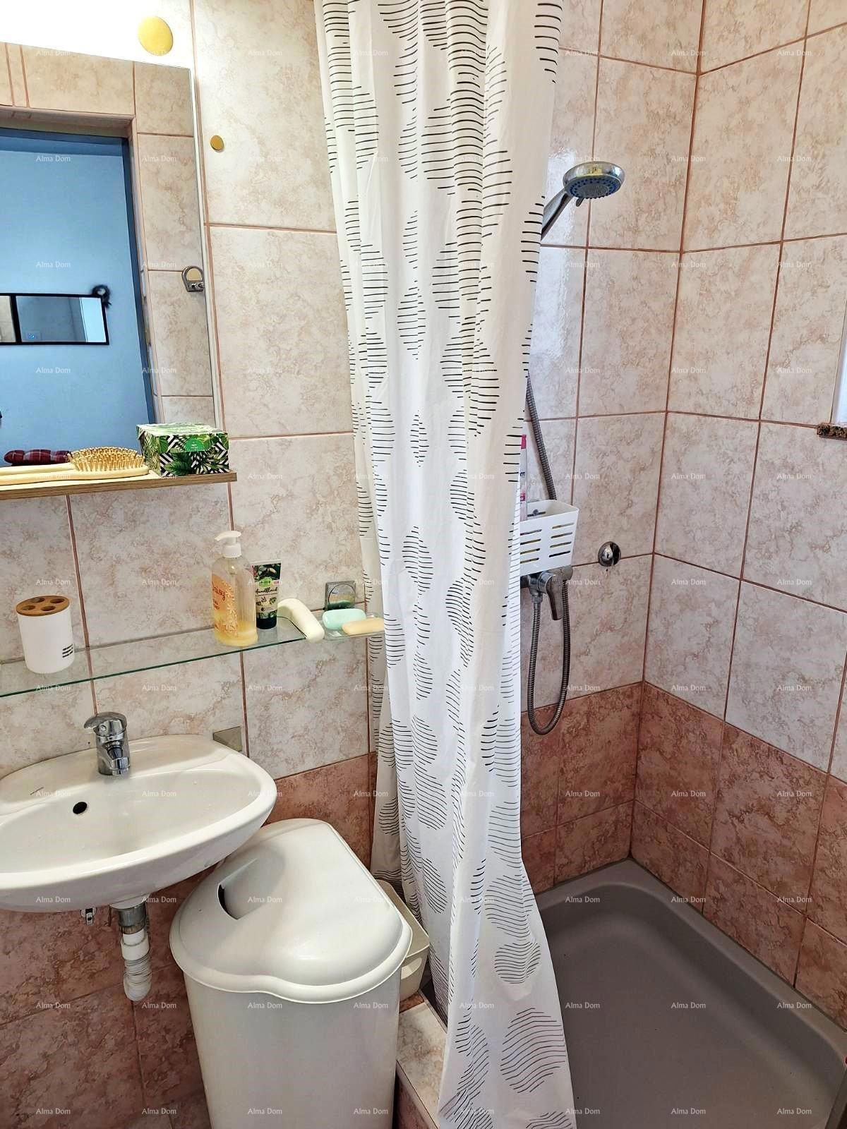 Prodaja stanovanja, 27 m², pritličje z lastniškim parkirnim mestom