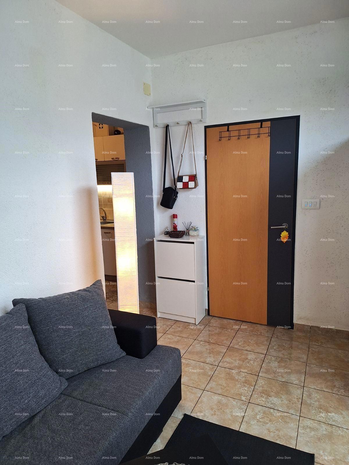 Prodaja stanovanja, 27 m², pritličje z lastniškim parkirnim mestom