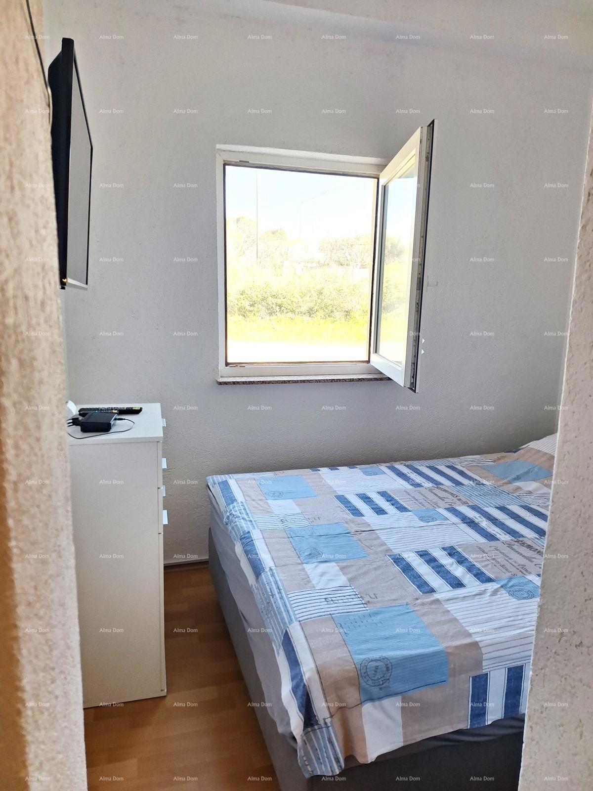 Prodaja stanovanja, 27 m², pritličje z lastniškim parkirnim mestom