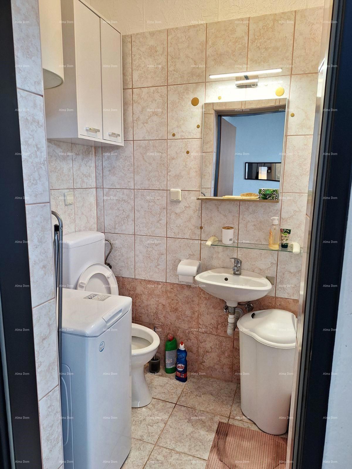Prodaja stanovanja, 27 m², pritličje z lastniškim parkirnim mestom