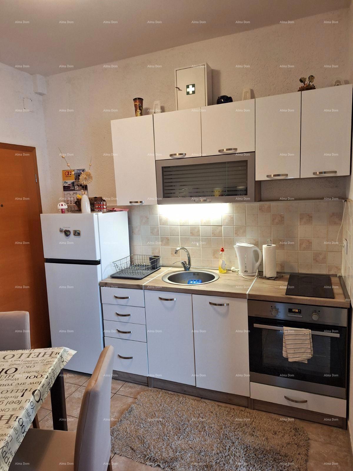 Prodaja stanovanja, 27 m², pritličje z lastniškim parkirnim mestom