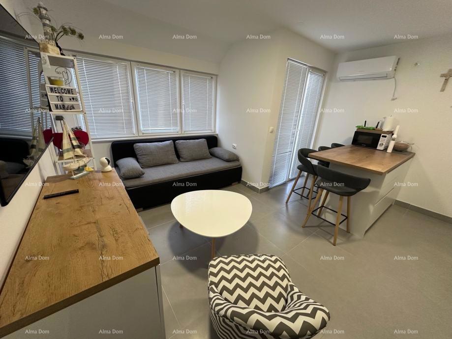 Prodaja opremljenega apartmaja v Novigradu, Mareda, 300 m od morja