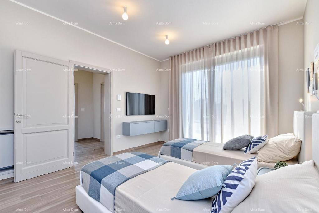 Fažana - Peroj - Čudovita vila s bazenom in pogledom na morje v bližini plaže