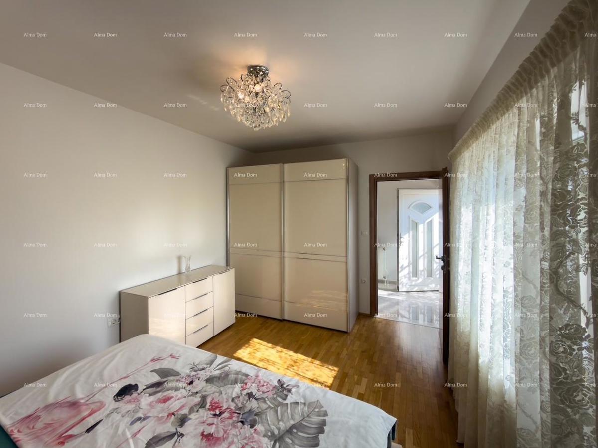 Ližnjan, urejena in popolnoma opremljena hiša z garažo in kletjo