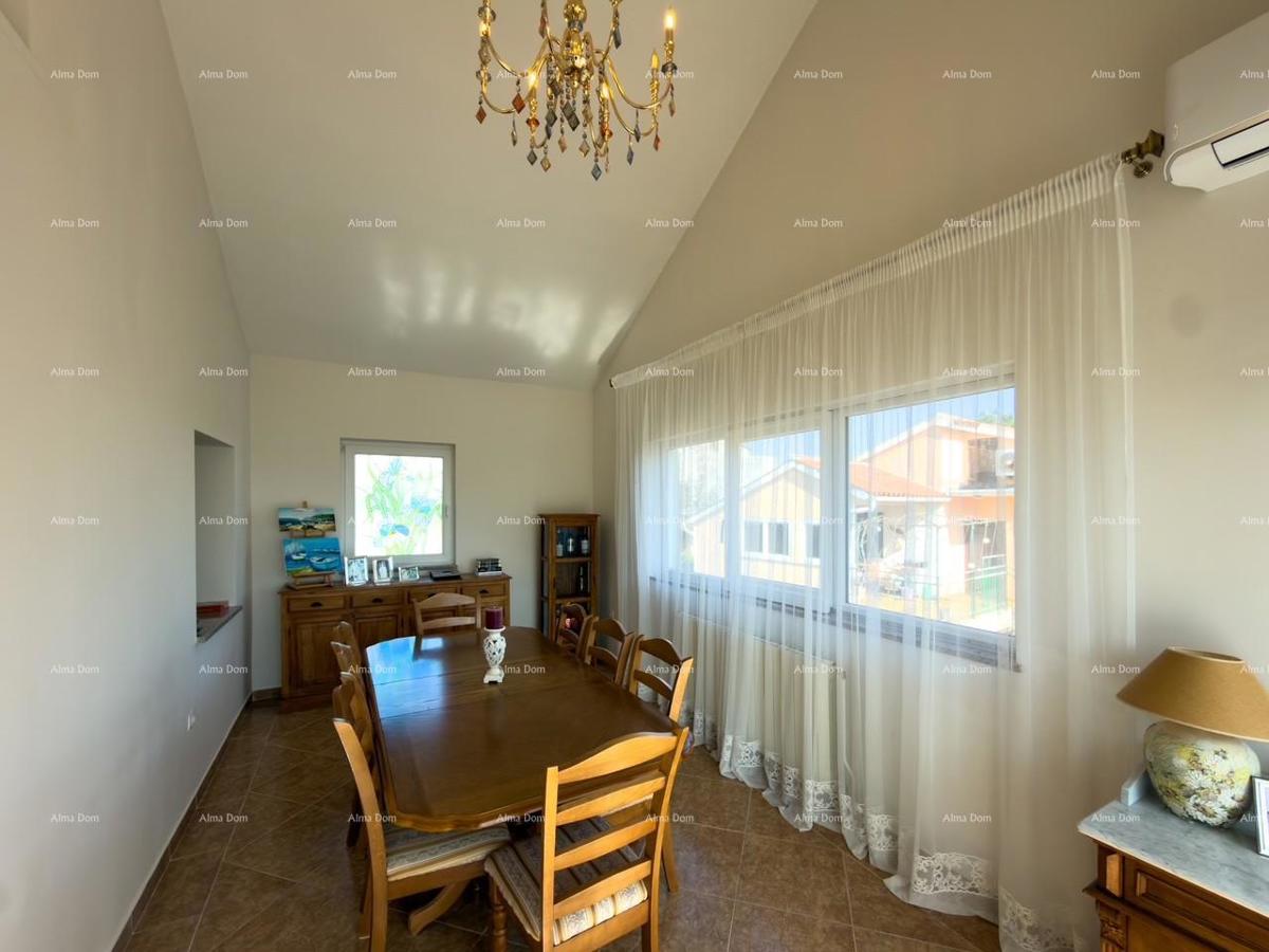 Ližnjan, urejena in popolnoma opremljena hiša z garažo in kletjo