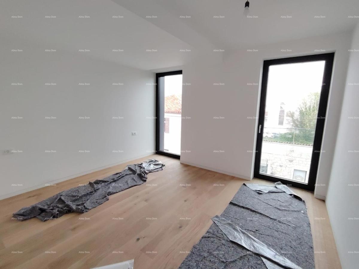 Prodamo stanovanja v stanovanjsko poslovni stavbi s pogledom na morje, center Umaga! / S9a