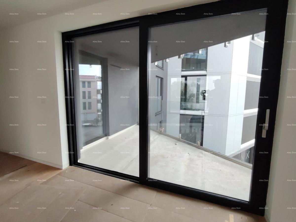 Prodamo stanovanja v stanovanjsko poslovni stavbi s pogledom na morje, center Umaga! / S9a