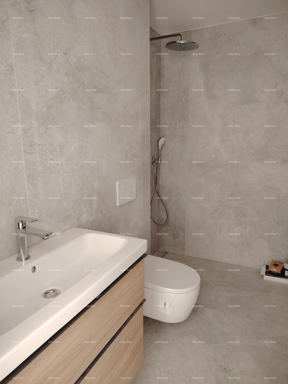 Prodamo stanovanja v stanovanjsko poslovni stavbi s pogledom na morje, center Umaga! / S9a