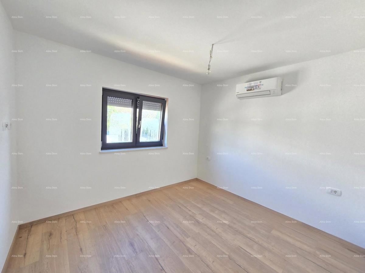 Trosobno stanovanje v 1. nadstropju novogradnje v bližini morja