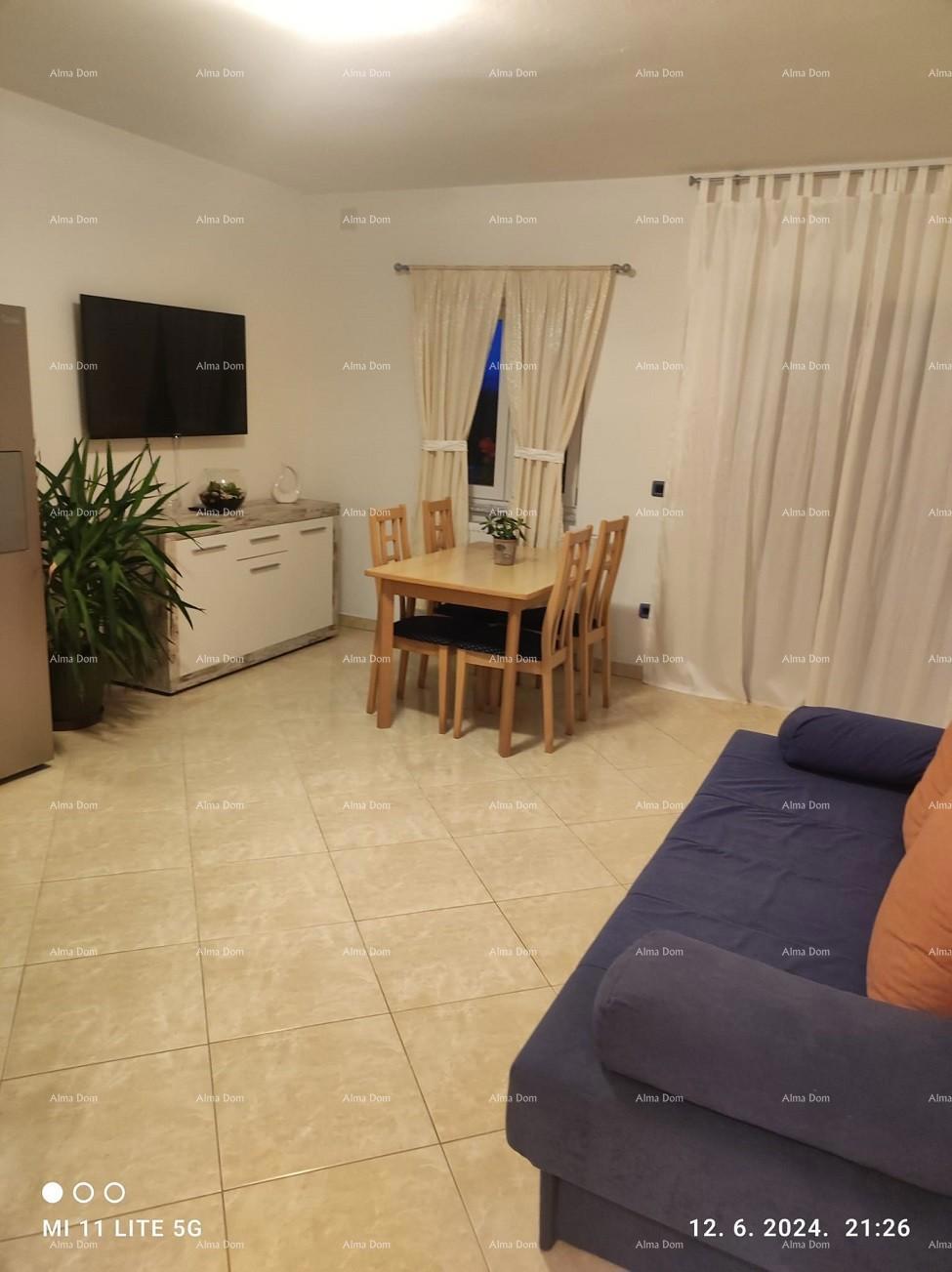 Apartmajska hiša s pogledom na morje