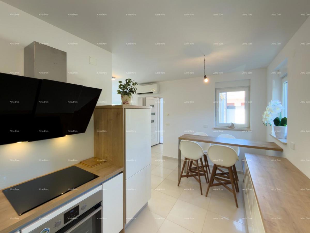 Prodaja atraktivne kuće v Premanturi z razgledom na morje