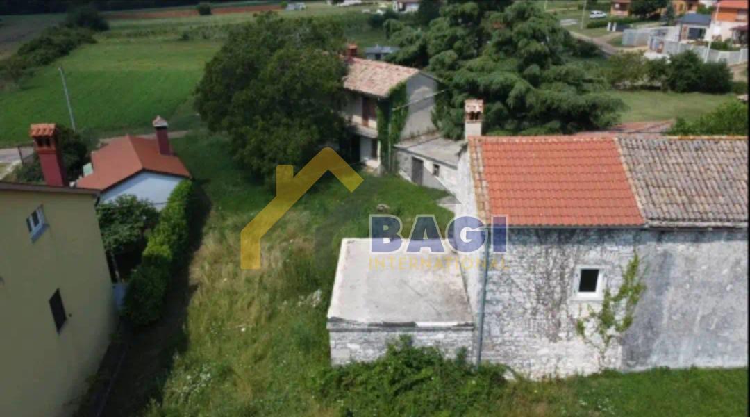 Stara istrska kamnita hiša na parceli velikosti 493 m2