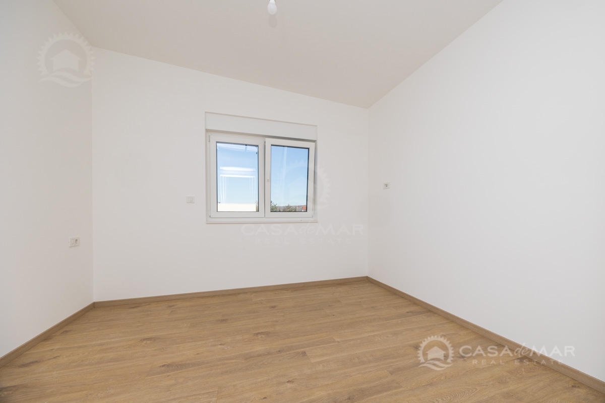 Apartma v Malinski s pogledom na morje in dodatnim apartmajem v pritličju – novogradnja!