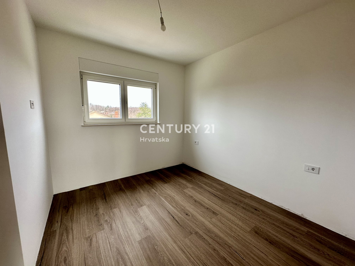 ŽMINJ, stanovanje v pritličju z dvema spalnicama