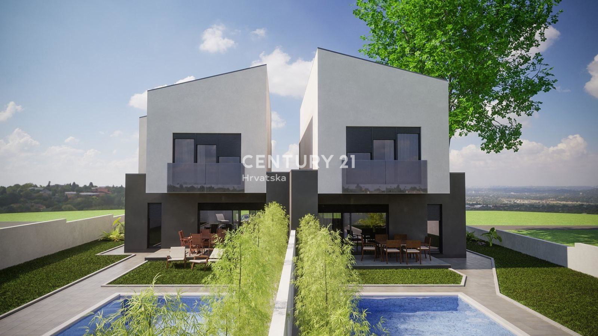 KAŠTELIR, GRADBENI ZEMLJIŠČE Z GRADBENO DOVOLJENJEM ZA DVE HIŠI