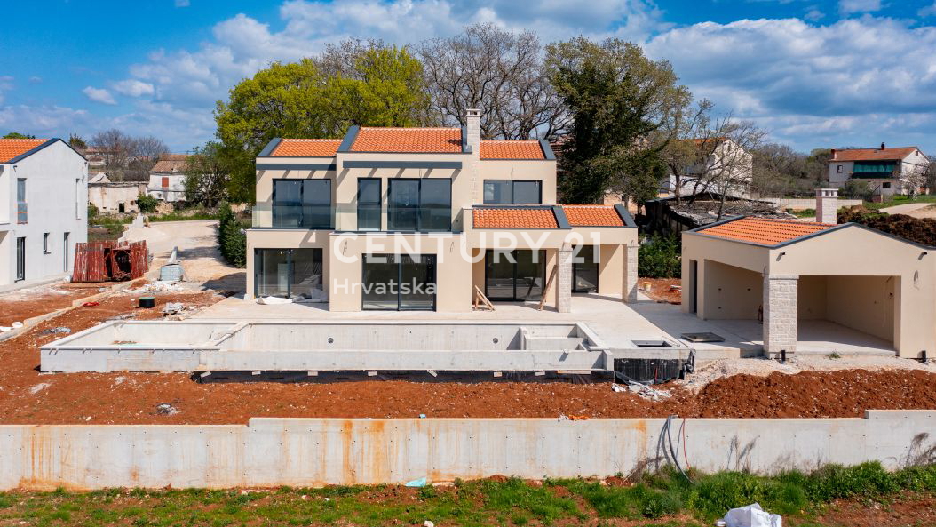 SVETI LOVREČ, PRODAJA SE NOVA HIŠA S BAZENOM IN POGLEDOM NA MORJE