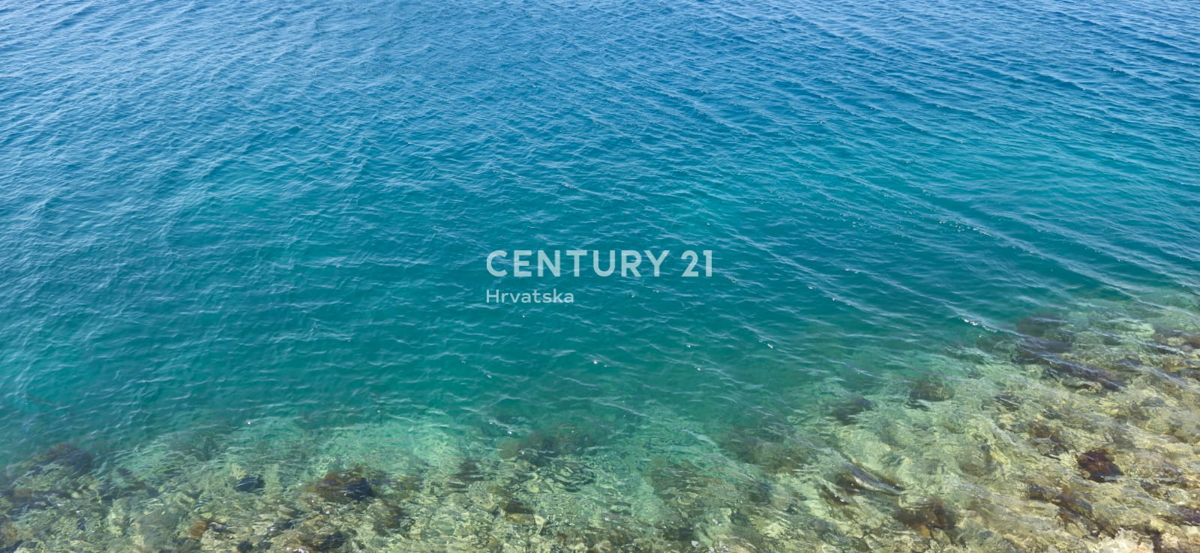 Lugovo Šugarje - Barić Drage - zemljišče ob morju, z začetim gradbenim projektom in gradbenim dovoljenjem