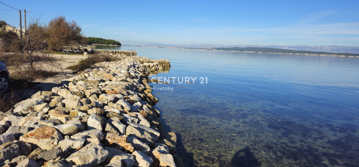 Pašman, Banj, gradbeno zemljišče, prvi vrsti do morja, površina 1760 m2
