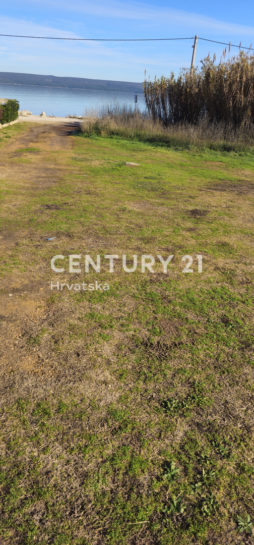 Pašman, Banj, gradbeno zemljišče, prvi vrsti do morja, površina 1760 m2