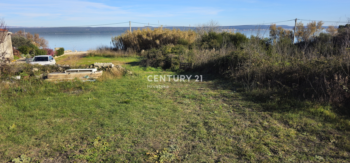Pašman, Banj, gradbeno zemljišče, prvi vrsti do morja, površina 1760 m2