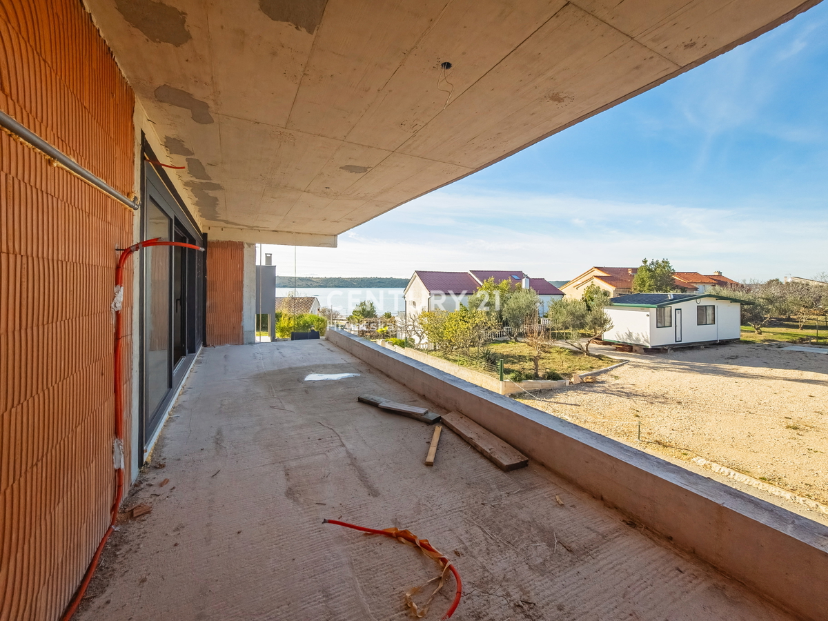 ZADAR, LJUBAČ, LUX. NOVOGRADNJA. S4= 100,66 m2, 1. nadstropje, 50 m do morja in plaže, pogled na morje