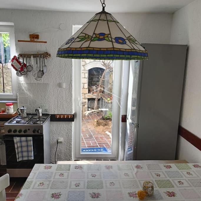 Hiša v središču Mali Lošinj z intimnim dvoriščem