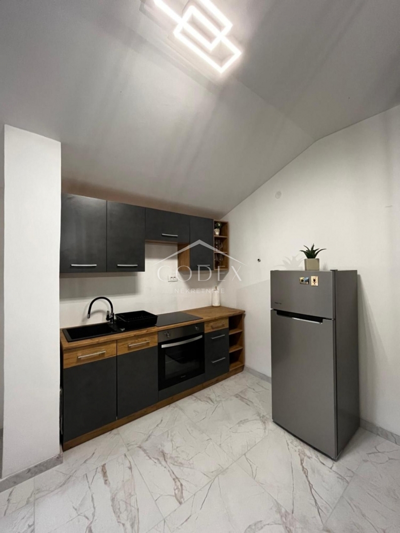 Malinska - prodaja hiše s 5 apartmaji za investicijo