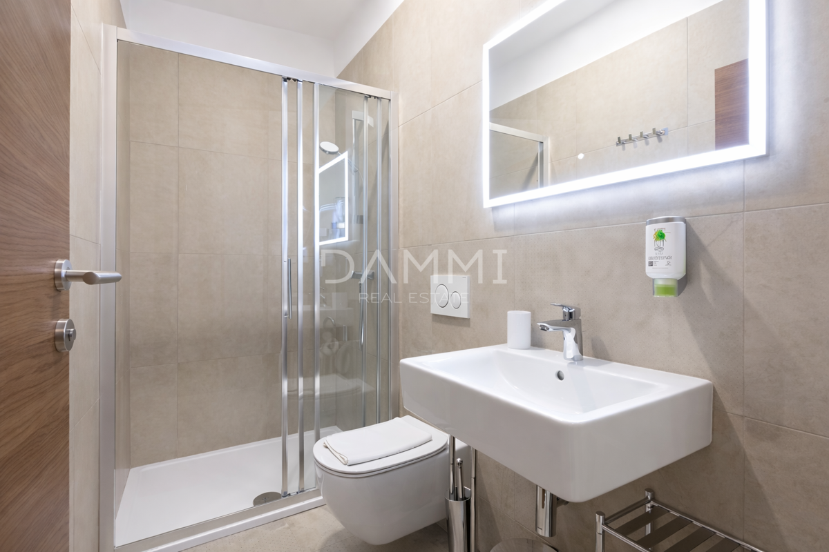 Pula, center - stanovanje s 4 enotami in parkirnim mestom