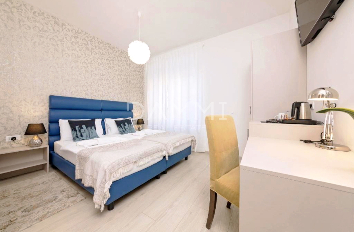 Pula, center - stanovanje s 4 enotami in parkirnim mestom