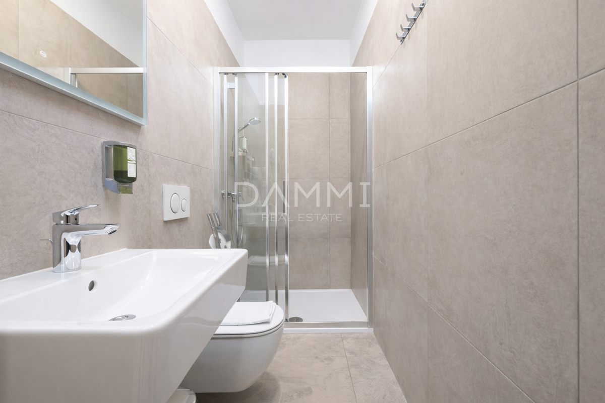 Pula, center - stanovanje s 4 enotami in parkirnim mestom