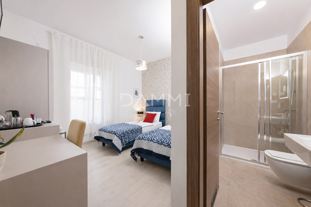 Pula, center - stanovanje s 4 enotami in parkirnim mestom