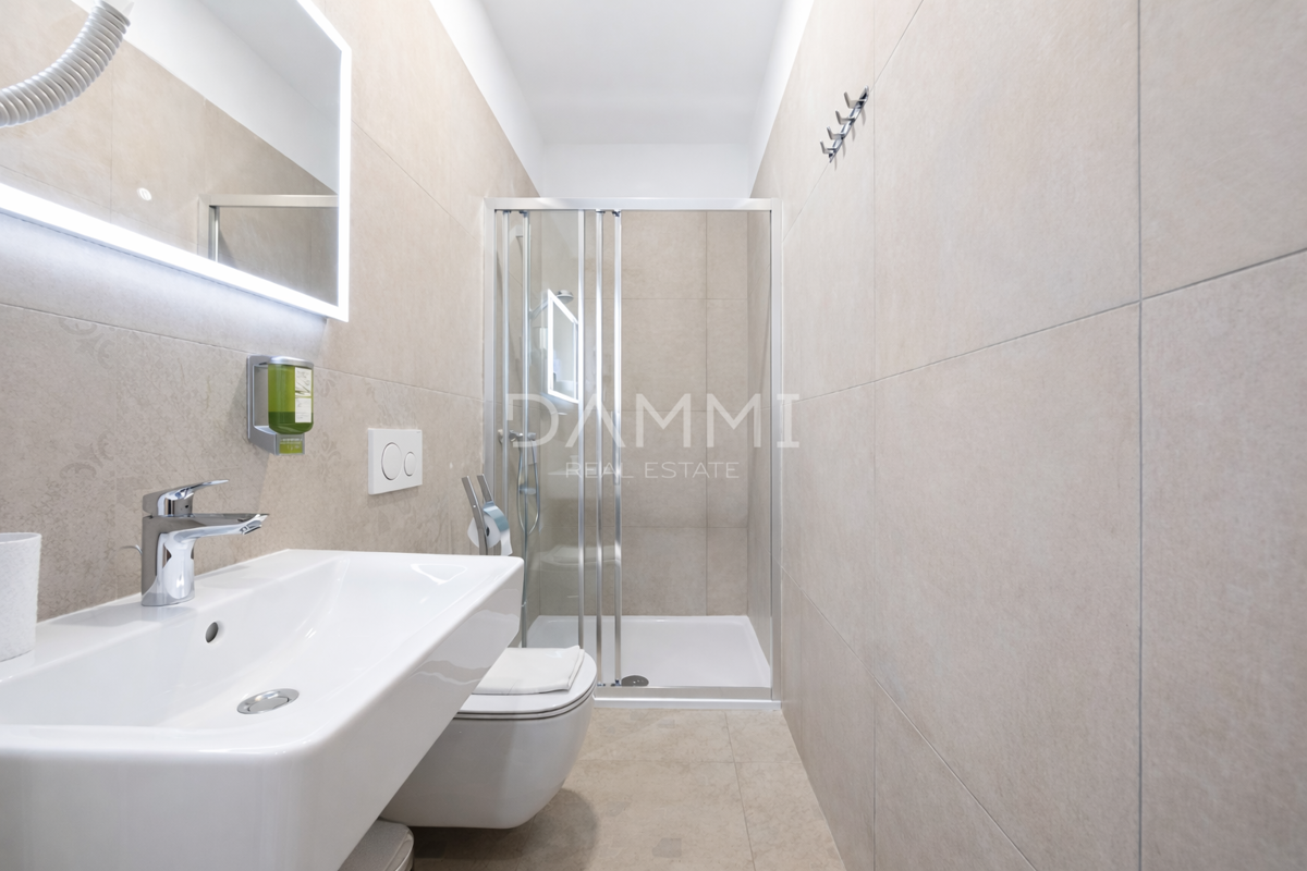 Pula, center - stanovanje s 4 enotami in parkirnim mestom