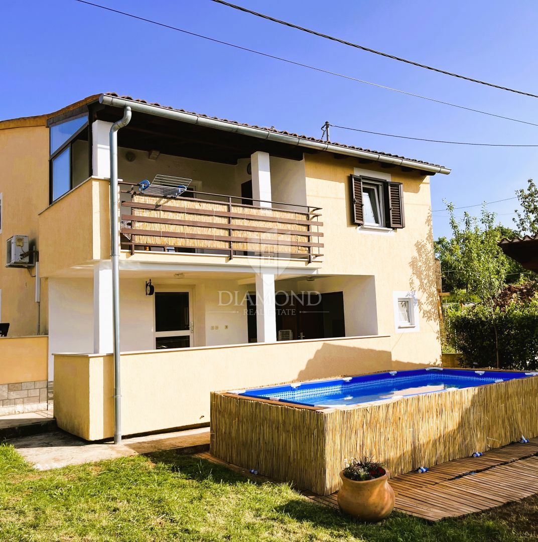 Hiša za najem v središču Karojbe