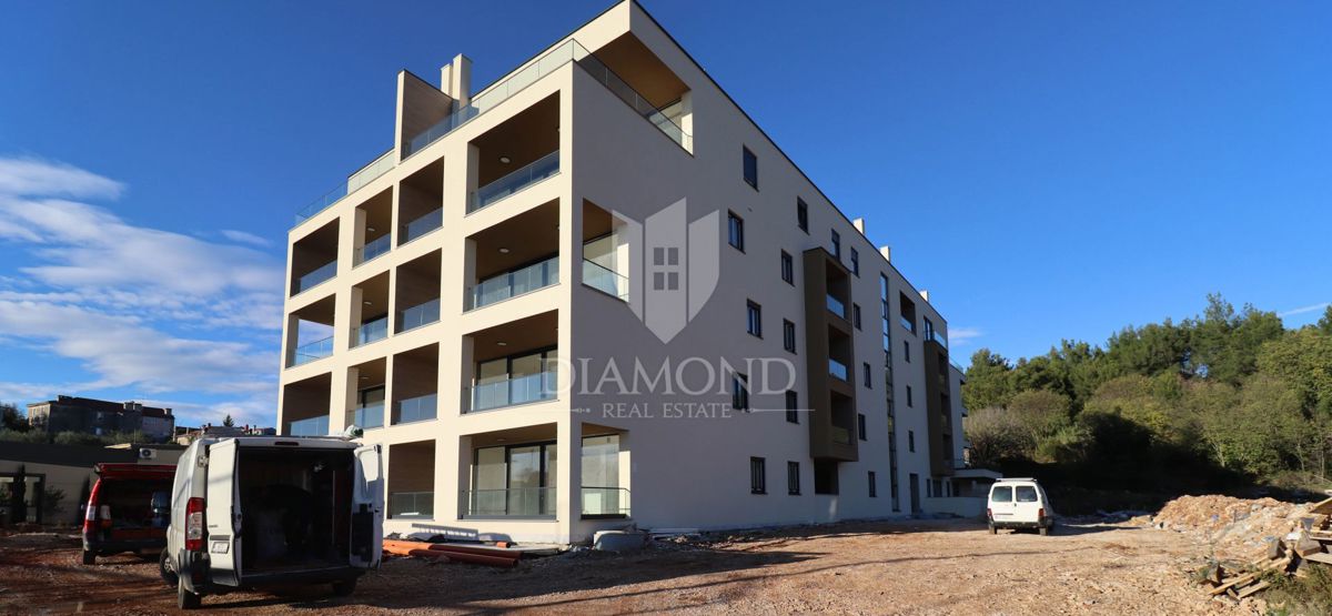 Novogradnja v zelenju, 55 m² stanovanje blizu morja in mestnega središča